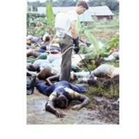 US Army Member Spraying Disinfectant Over Dead Bodies from Jonestown